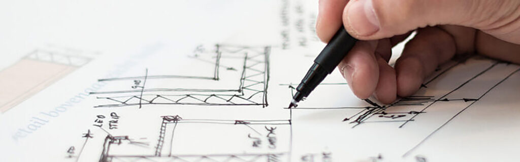 Picture of an engineer drawing a diagram